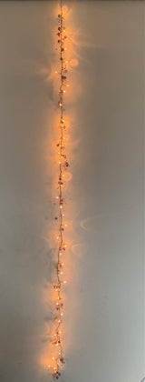 40 warm white LED rice lights with purple and white beads
