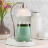 Candle Warmers Aurora Glass Candle Lamp with curved silver stem and white matt base, offering a soft glow and safe, flameless ambiance.