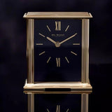 William Widdop gold mantel clock with navy blue dial