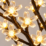 Close-up of warm white LED blossom flowers on 45cm cherry blossom tree