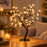 45cm warm white LED cherry blossom tree in a cosy indoor display