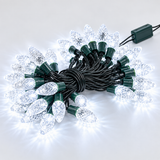 50 white LED strawberry Christmas lights illuminated