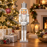 Close-up of white and silver wooden nutcracker soldier detail