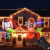 Christmas LED projector effects on house exterior