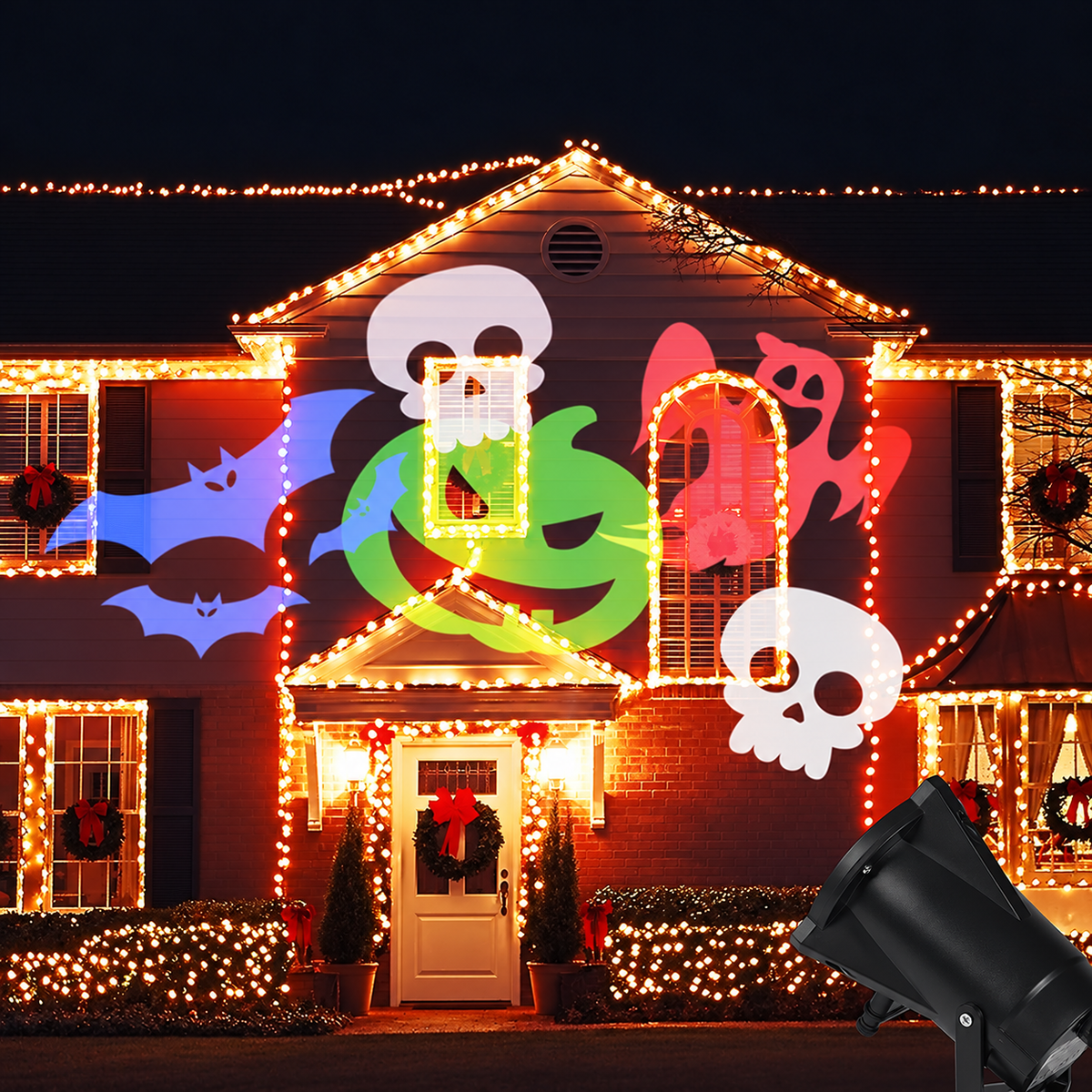 Halloween LED projector patterns on house with green pumpkin bats ghosts and skulls
