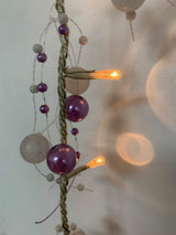 40 warm white LED rice lights with purple and white beads