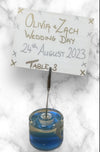 Blue dolphin place card holder for weddings and table settings