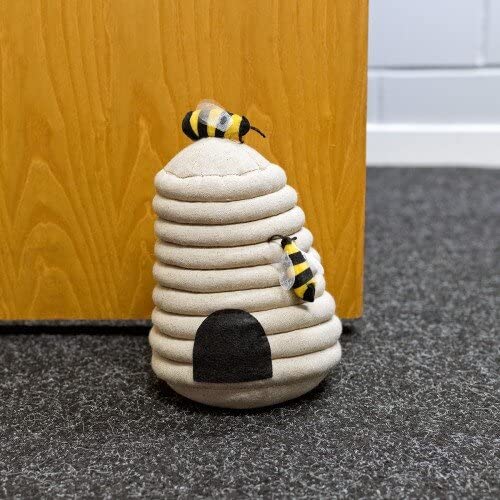 Beehive fabric door stop with beige honeycomb design