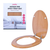Antique pine-effect toilet seat with chrome hinges