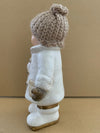 White ceramic Boy with creme coloured woolen hat