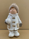 White ceramic Boy with creme coloured woolen hat