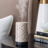 Airomé Inspire Ceramic Essential Oil Diffuser|100 mL Humidifying Ultrasonic Aromatherapy Diffuser 8 Colorful LED Lights, Intermittent & Continual Mist Auto Shut-Off, Cream Floral