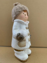 White ceramic Boy with creme coloured woolen hat