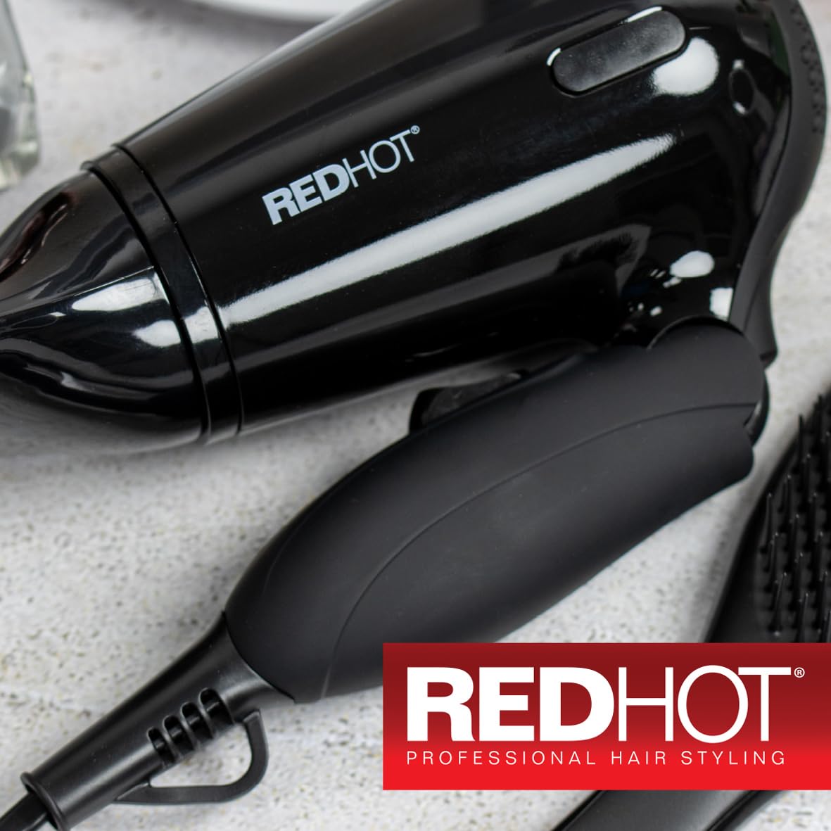 Red Hot black folding dual voltage travel hair dryer