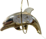 Gold-plated dolphin ornament with crystal detail and mirrored stand