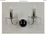 Chrome-effect wall light with hanging crystal droplets