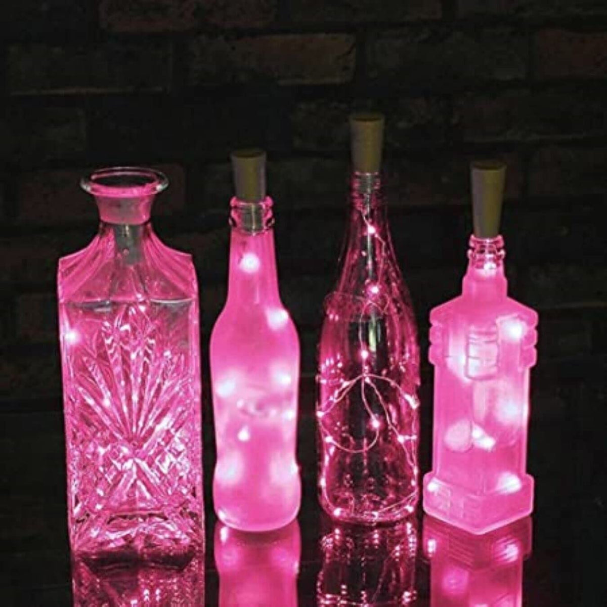 Pink LED wine bottle cork lights four pack with ten LEDs each