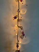 40 warm white LED rice lights with purple and white beads