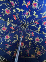 Blue patterned compact telescopic umbrella with cover