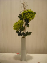 Green artificial flower arrangement in white vase – 53cm