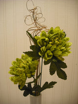Green artificial flower arrangement in white vase – 53cm