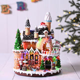 30cm battery-operated LED gingerbread house with rotating characters