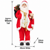 90cm standing Santa Christmas figure in a festive evening display