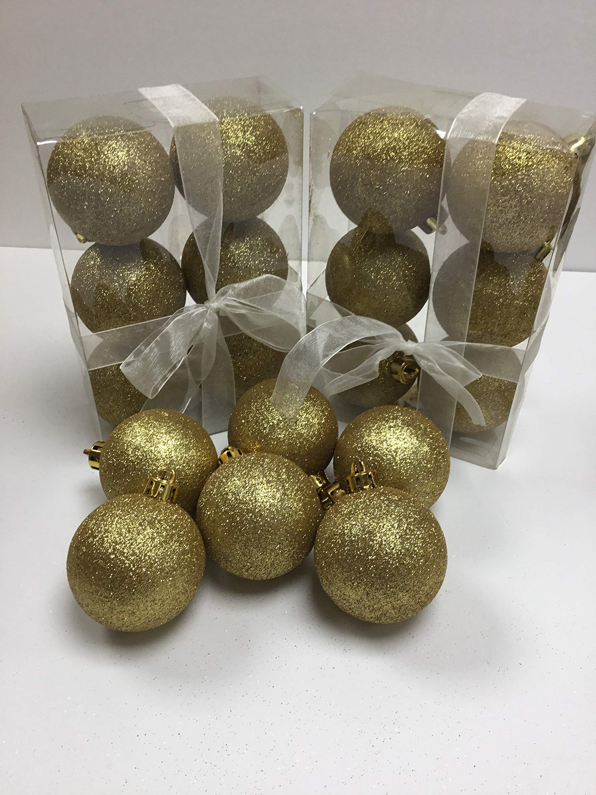 18 sparkling gold glitter Christmas baubles, 60mm