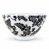 Black and white floral ceramic breakfast bowl close-up on a plain white background
