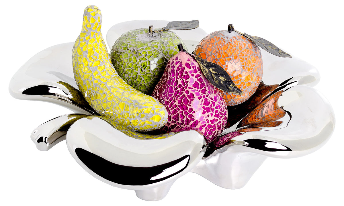 Reflective ceramic clover bowl filled with assorted fruit