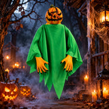 Evil pumpkin hanging ghost Halloween decoration in spooky misty outdoor scene
