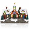 LED Christmas village street scene with snowy houses and church front view