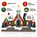 LED Christmas village street scene in a festive mantel display