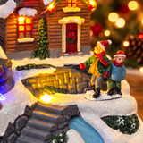 Cabin and snowy scene detail on Widdop XM6602 musical Christmas village