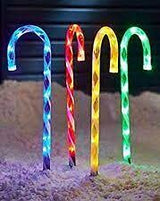 Four light-up candy cane Christmas stakes with 40 multicoloured LEDs