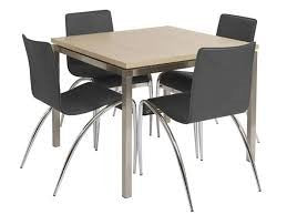 Actona Que light ash dining table with four black leather chairs