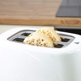 White Quest toaster with defrost reheat and stop buttons