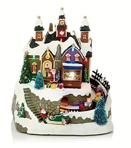 Musical LED Christmas village snow scene with moving train 23cm