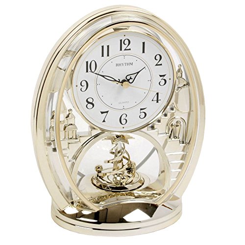 Rhythm Cont Mantel Clock Oval Gilt/Arabic Dial/Rotating Pendant