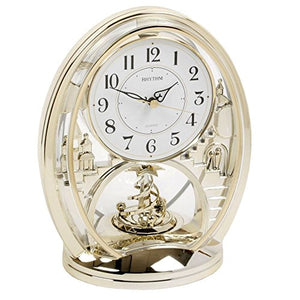 Rhythm Cont Mantel Clock Oval Gilt/Arabic Dial/Rotating Pendant