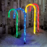 Four light-up candy cane Christmas stakes with 40 multicoloured LEDs