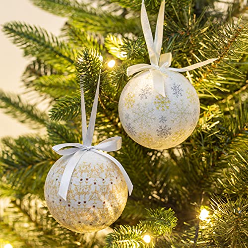 White and gold Christmas baubles with snowflake and icicle designs