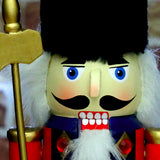 Red blue wooden nutcracker soldier festive ornament