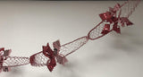 Festive red and pink foil hanging garland