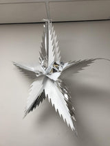 Spiked star foil Christmas decoration detail