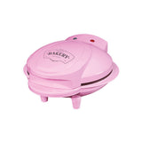Compact pink seven-cupcake maker for home baking
