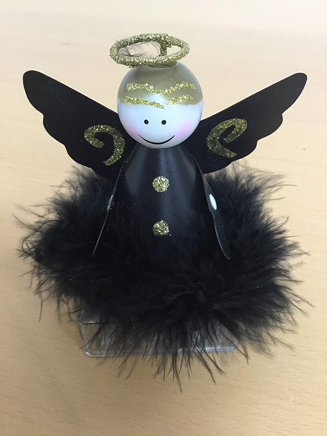 Gold and black battery-operated tabletop Christmas angel with glitter wings