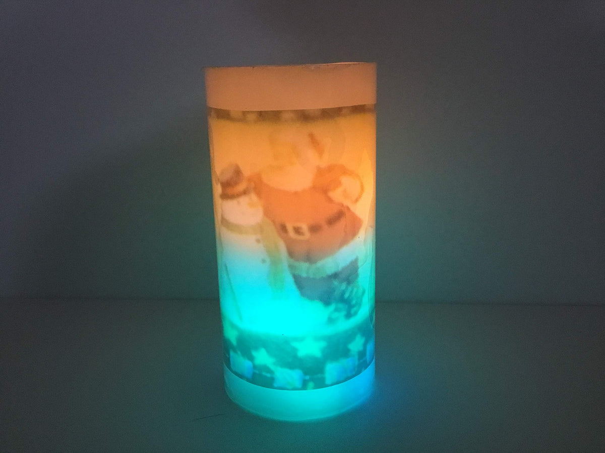 Premier LED Santa pillar candle with colour-changing flicker