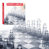 Clear and frosted glass chess pieces on board
